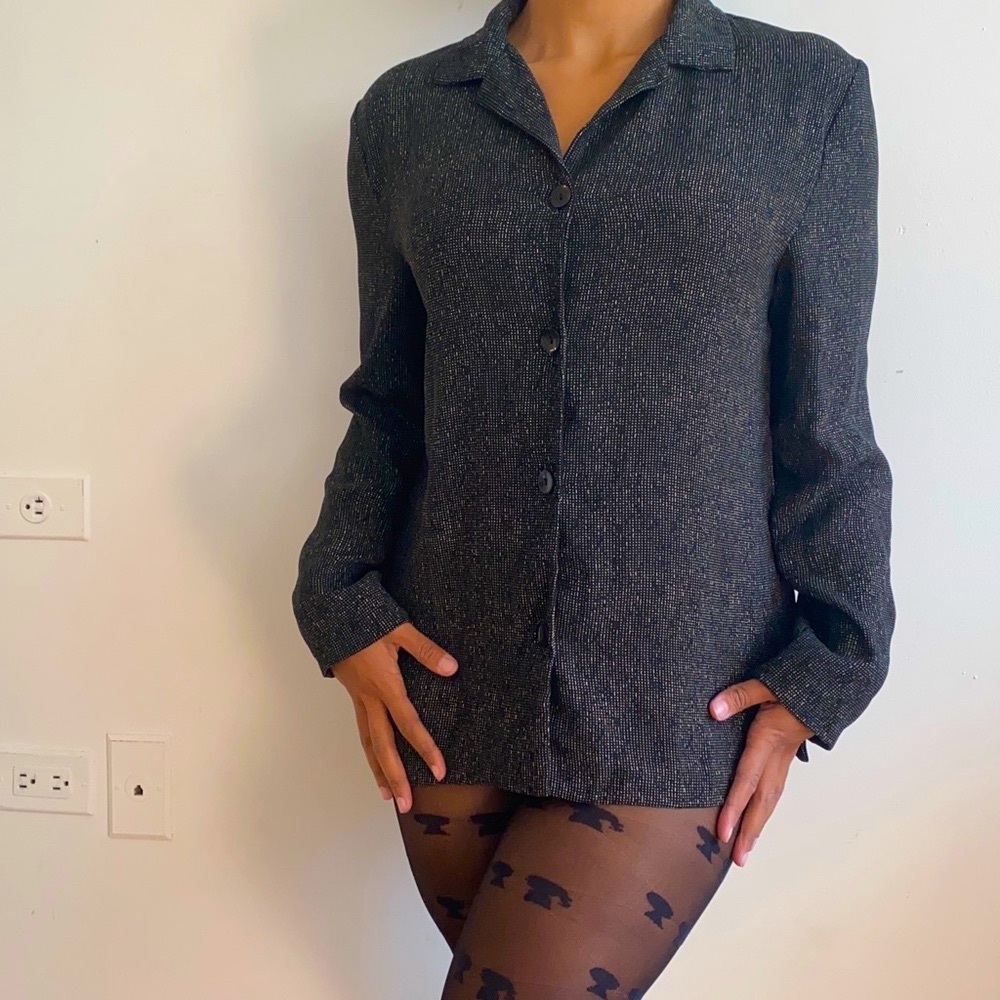 Mini black blazer can be worn as a dress.